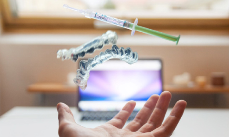 open hand with dental technology implements floating above